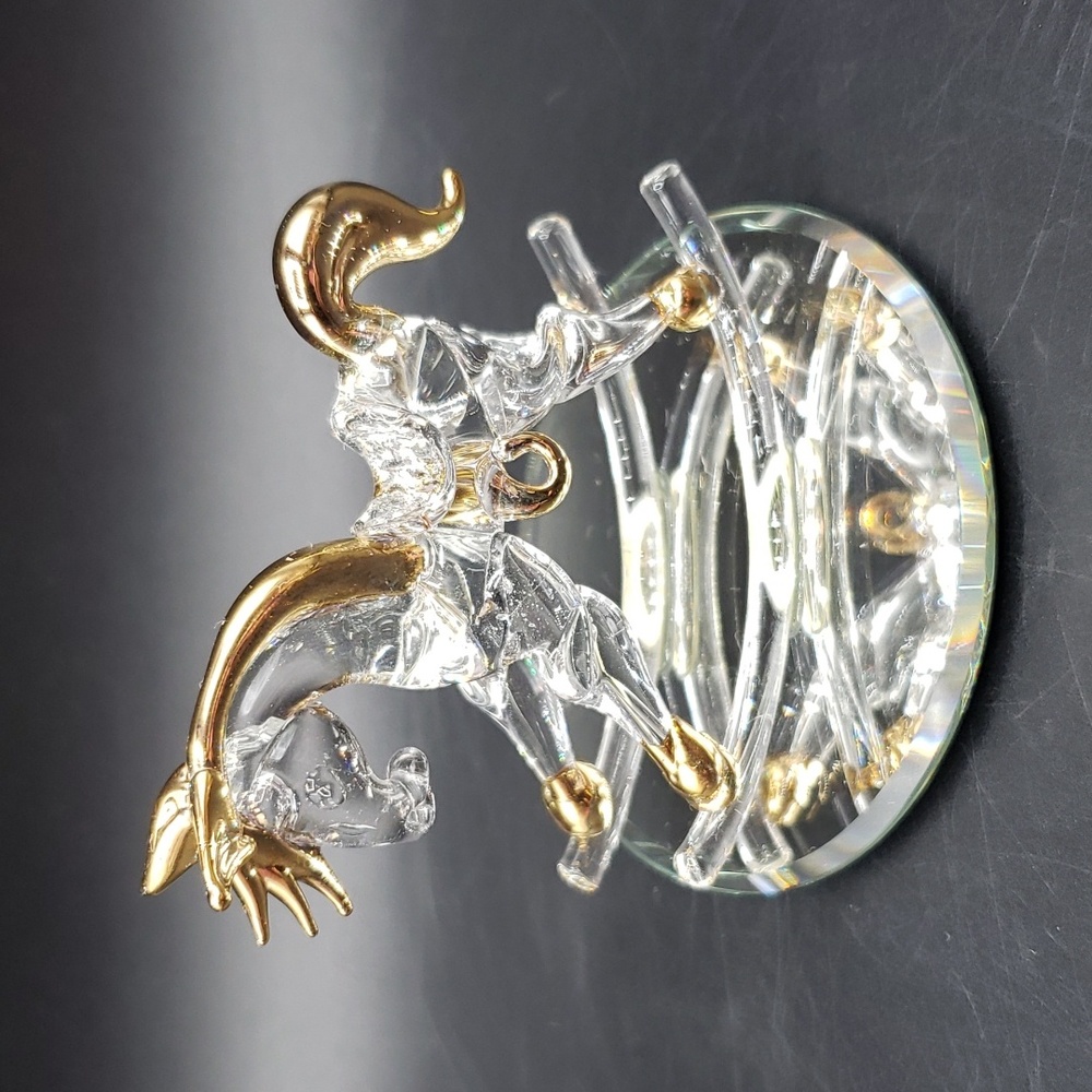 Hand Made Art Glass Rocking horse on a mirror base.